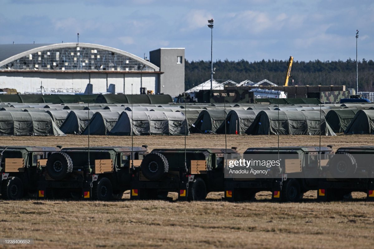 US military equipment and soldiers are inside in a temporary base in Mielec, Poland