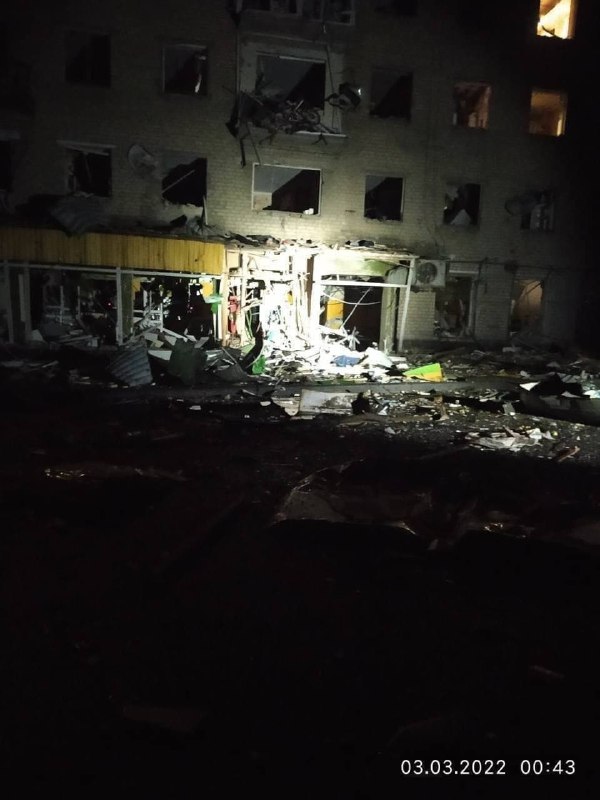 Photo: Damage to residential apartments block hit in airstrike in Izyum