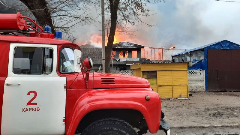 Rescuers working after shelling targeted and damaged multiple civilians building in Pivnnichna Saltivka in Kharkiv