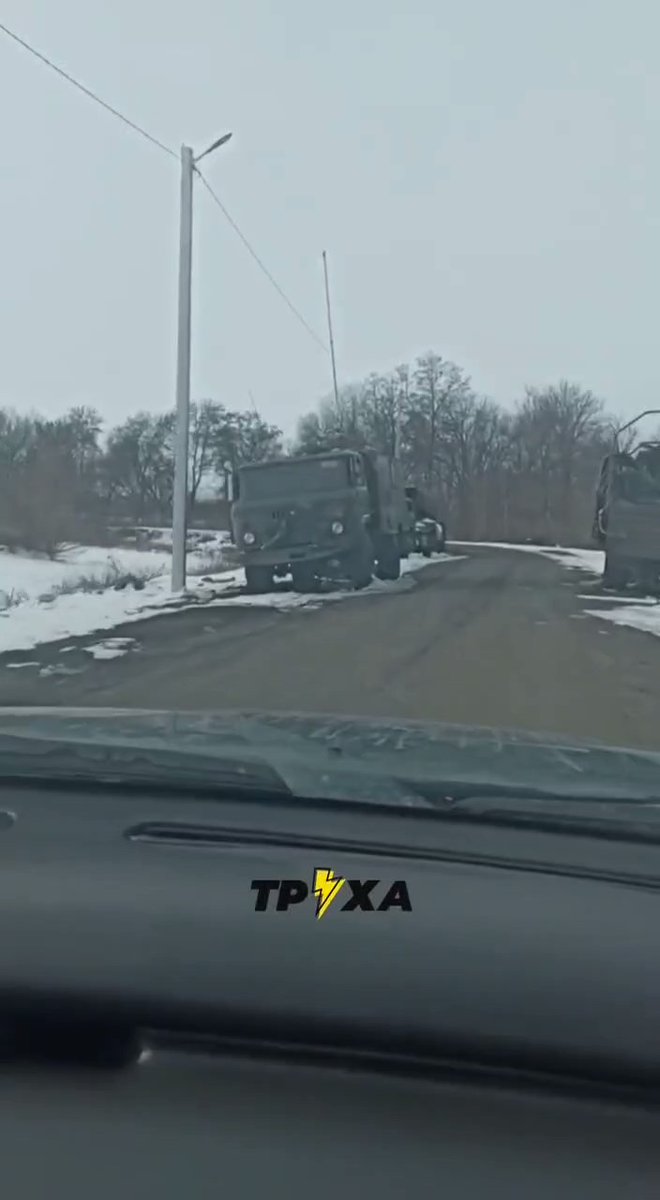 Video showing multiple vehicles (trucks and BM-21 MLRS) abandoned by Russian forces near Slatyne town, Kharkiv area