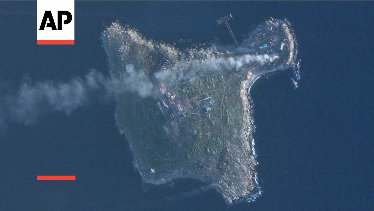 Satellite photos by @planet taken just after 6 a.m. Sunday analyzed by the @AP show smoke rising from two points on Snake Island from Ukrainian strikes. One corresponds to video Ukraine released of a strike on a Russian helicopter. A Z is seen on the island's northeast corner