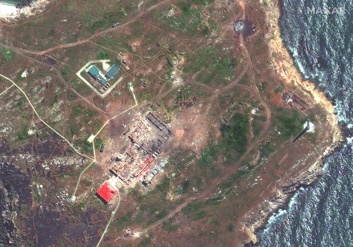 Ukrainian drone strikes destroyed Russian air defenses on Snake Island in the Black Sea, shown here in satellite image taken today.  The Ukrainian drones took out Pantsir surface to air missile vehicles and destroyed several buildings on the island.   camera:@Maxar