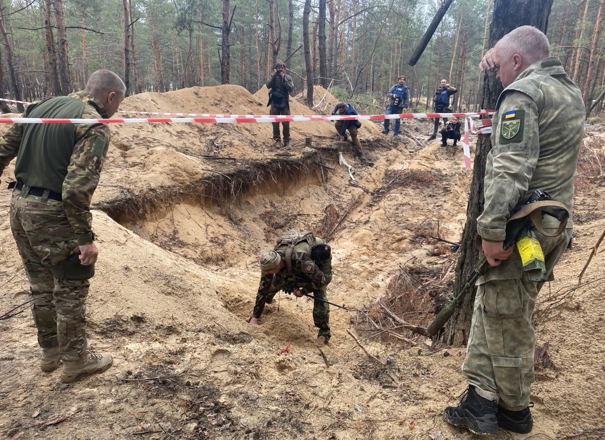 A large mass grave of Ukrainian soldiers and about 500 civilian burials were discovered in Izyum