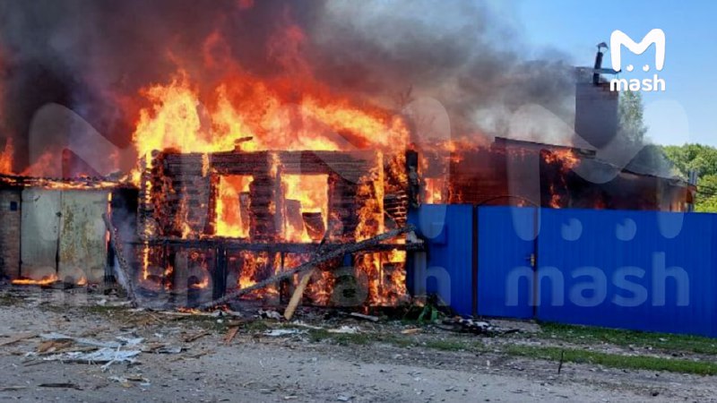 Several houses on fire after shelling with MLRS GRAD in Belaya Berezka village of Briansk region
