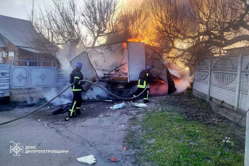 A vehicle caught fire after being targeted by loitering ammunition in Nikopol